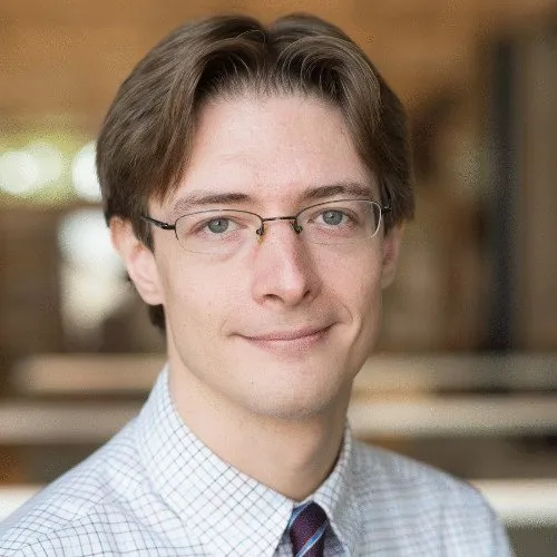 Headshot of Tristan Deveney, Founder of Predicate Higher Ed
